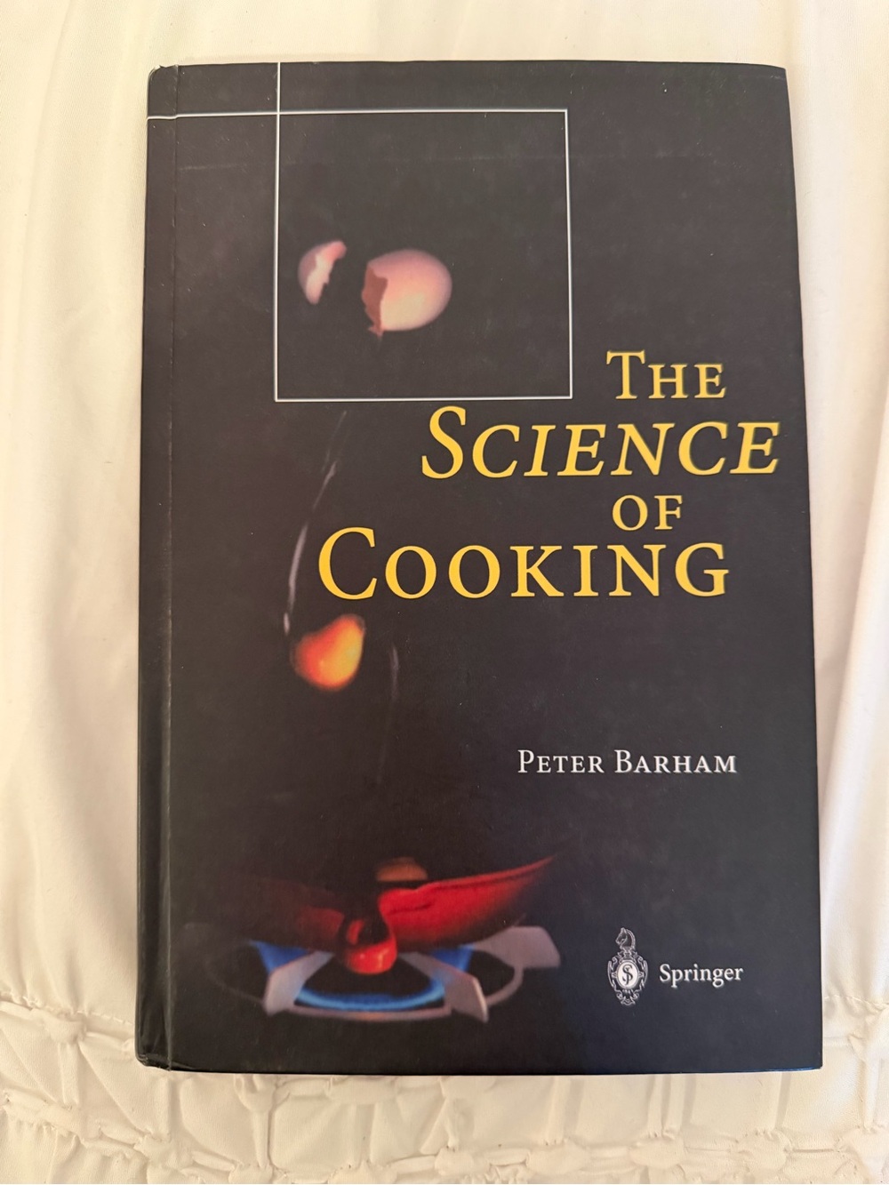 The Science of Cooking by Peter Barham - Black Cover with Yellow Text